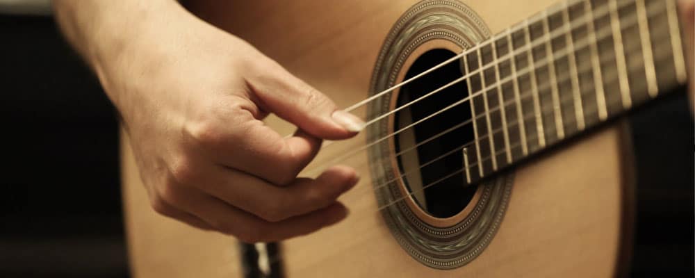 right hand playing classical guitar