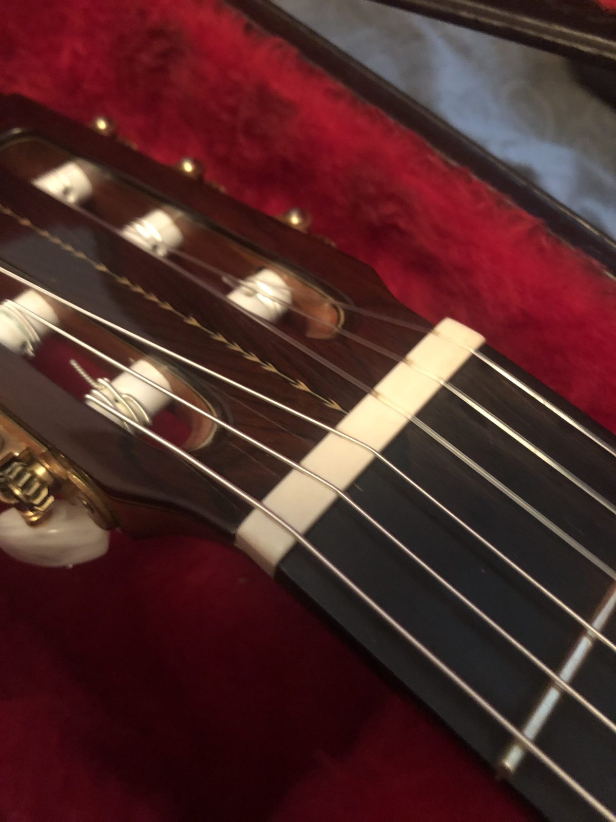 Classical Guitar nut width example. Where is the guitar nut? The Guitar nut is a material that holds the strings in place where the neck meets the headstock.